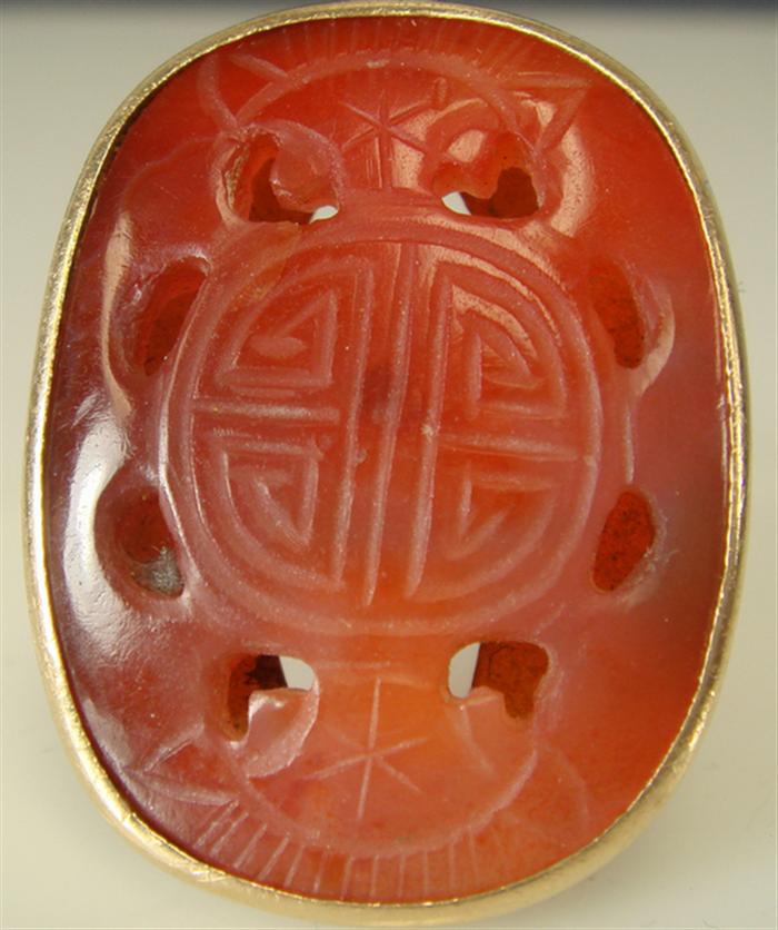 Appraisal: K yg Carved Jade ring Large oval Chinese carving in