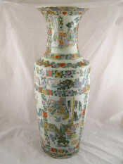 Appraisal: A very tall th c Chinese ceramic vase with panels