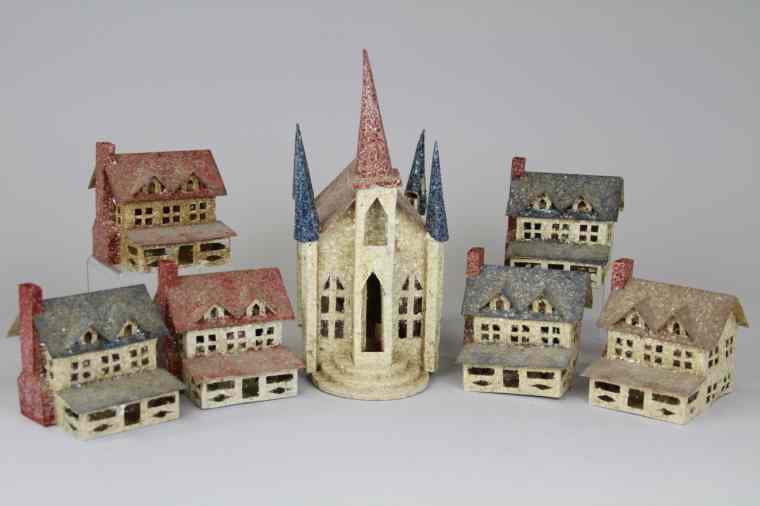 Appraisal: FOLK ART CHRISTMAS PUTZ SET OF HOUSES Consists of church