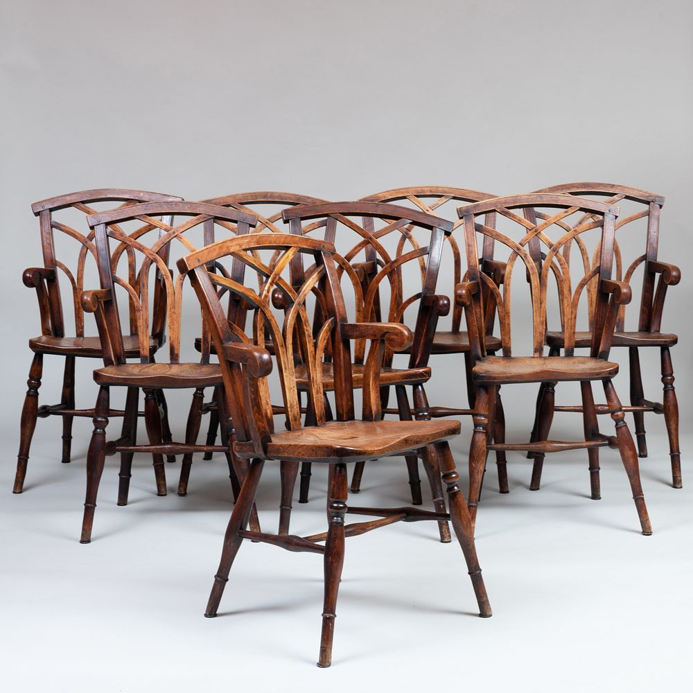 Appraisal: Assembled Set of Eight Neo-Gothic Elm Windsor Armchairs Three chairs