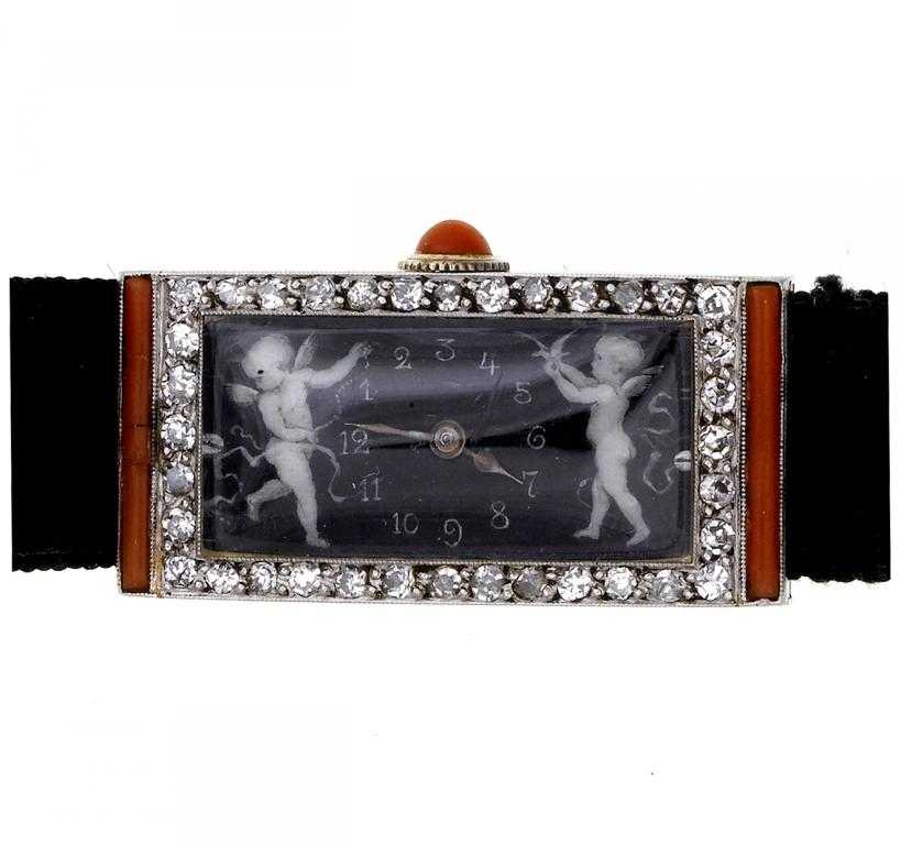 Appraisal: AN UNUSUAL ART DECO DIAMOND AND CORAL COCKTAIL WATCH the