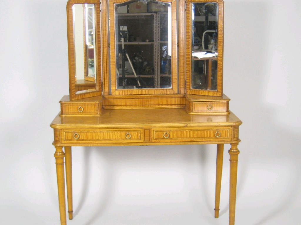 Appraisal: An Edwardian satinwood Dressing Table having three mirrors and fitted