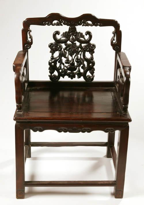 Appraisal: ARMCHAIR China th century possibly hongmu wood Pierced carved Qing