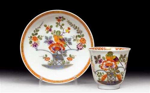 Appraisal: BEAKER AND SAUCER WITH TISCHCHEN PATTERN AND BIRD Meissen circa