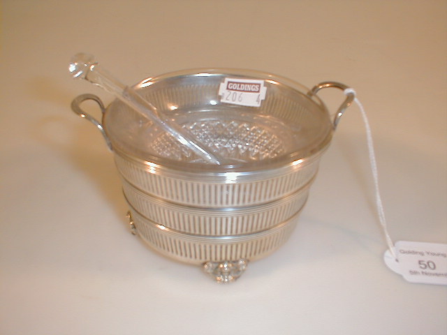 Appraisal: A pierced silver basket with replacement liner and icebreaker