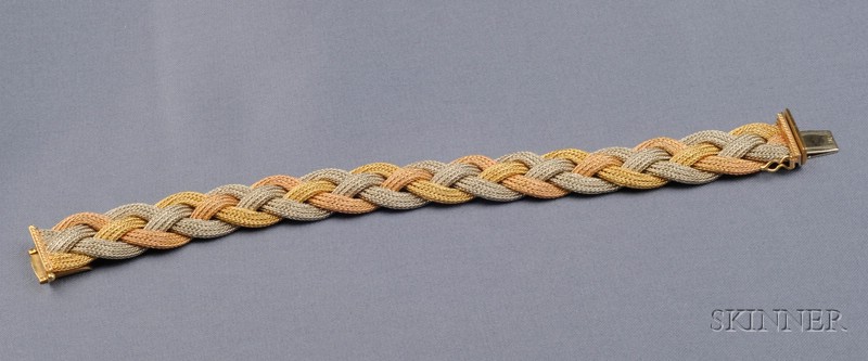 Appraisal: k Tricolor Gold Bracelet designed as braided foxtail chain dwt