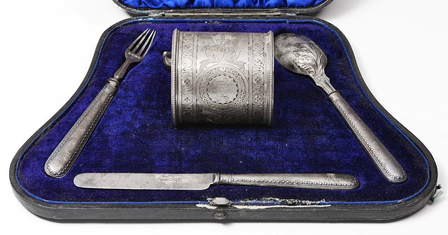 Appraisal: A VICTORIAN SILVER CHRISTENING SET consisting of a tankard with