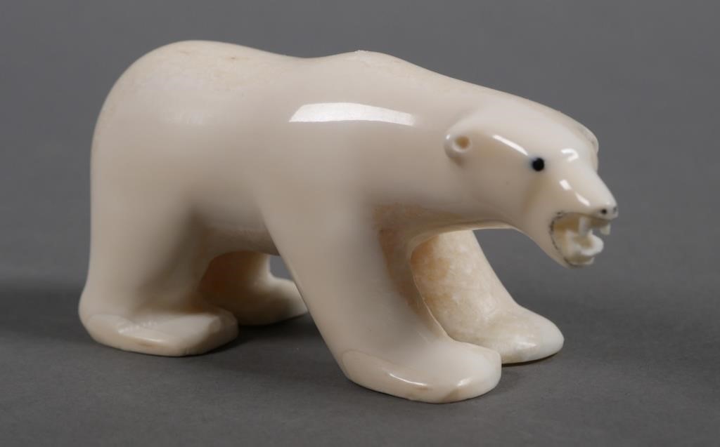 Appraisal: Vintage Alaskan hand carved ivory sculpture of a polar bear