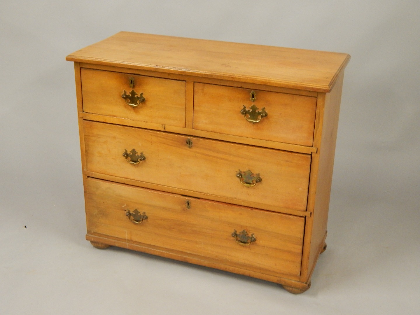 Appraisal: A Victorian satin walnut chest of drawers two short and