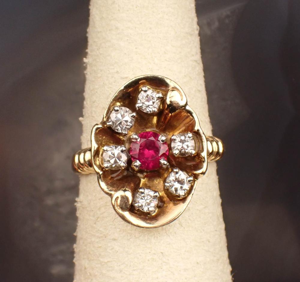 Appraisal: DIAMOND RUBY AND FOURTEEN KARAT GOLD RING The yellow gold