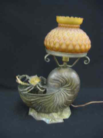 Appraisal: Bronzed Figural Nautilus Shell Lamp crab at opening amber satin