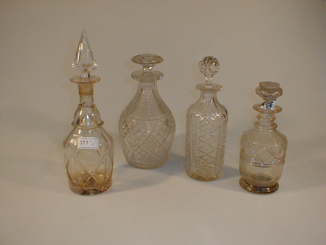 Appraisal: Two Georgian cut glass decanters a slice cut decanter and