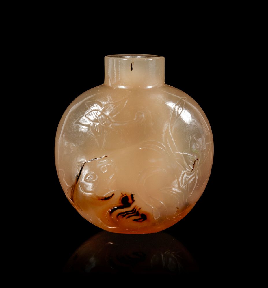 Appraisal: A Carved Agate Snuff Bottle Height in cm A Carved