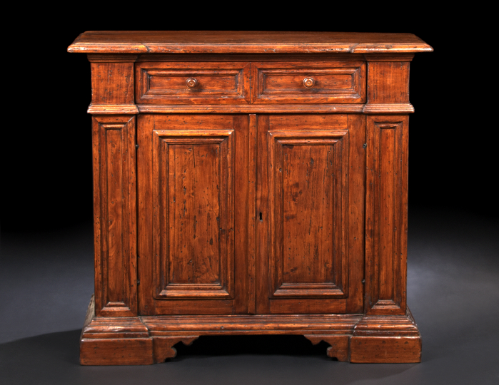 Appraisal: Italian Fruitwood Cabinet the rectangular top with projecting corners above