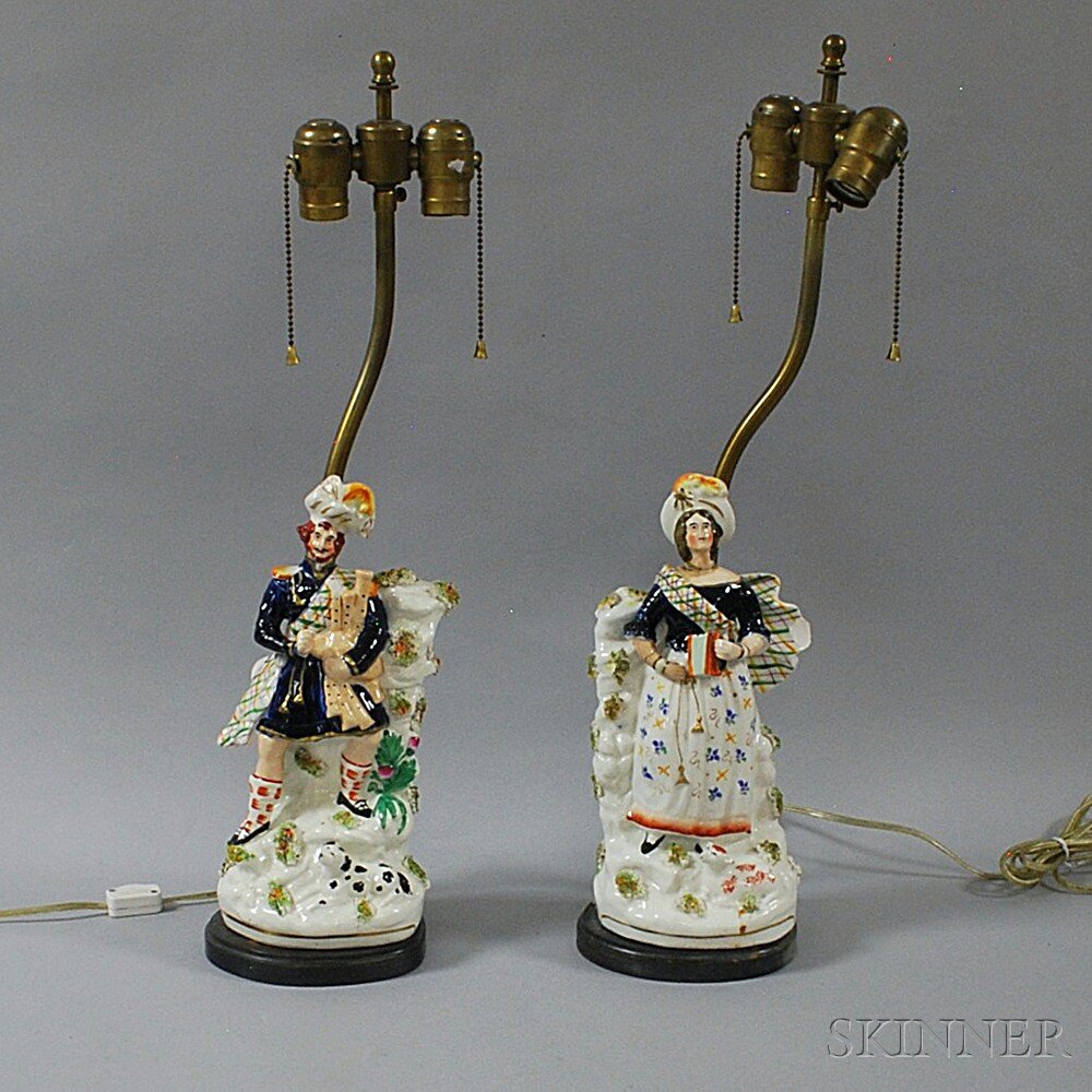 Appraisal: Two Staffordshire Figures England th century depicting a man and