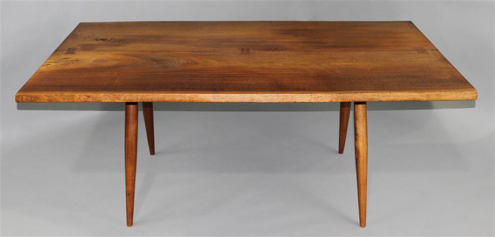 Appraisal: GEORGE NAKASHIMA BLACK WALNUT TURNED LEG DINING TABLE with three