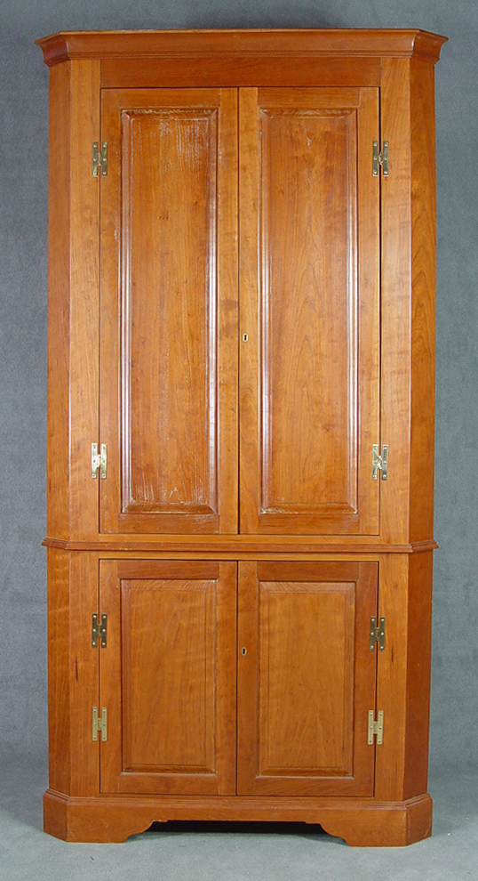 Appraisal: Cherry Corner Cupboard th Century Cavetto cornice above two over