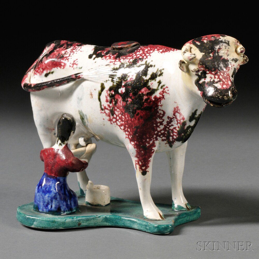 Appraisal: Yorkshire Earthenware Cow Creamer with Milkmaid England early th century