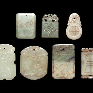 Appraisal: Seven Chinese Jade Carved Plaques comprising one spinach jade example