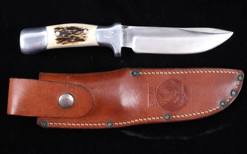 Appraisal: R H Ruana Camp Knife Leather Scabbard This is an