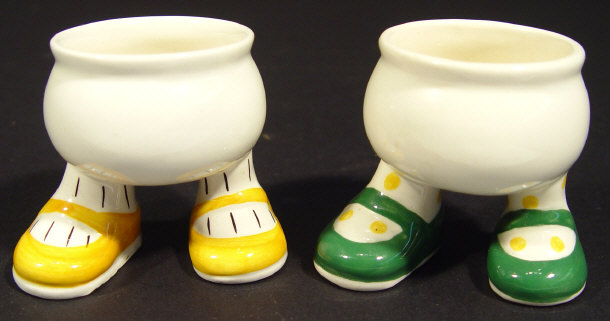 Appraisal: Two Carlton Walking-Ware china eggcups each with hand painted decoration