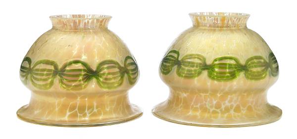 Appraisal: A pair of Loetz decorated iridescent glass shades circa height