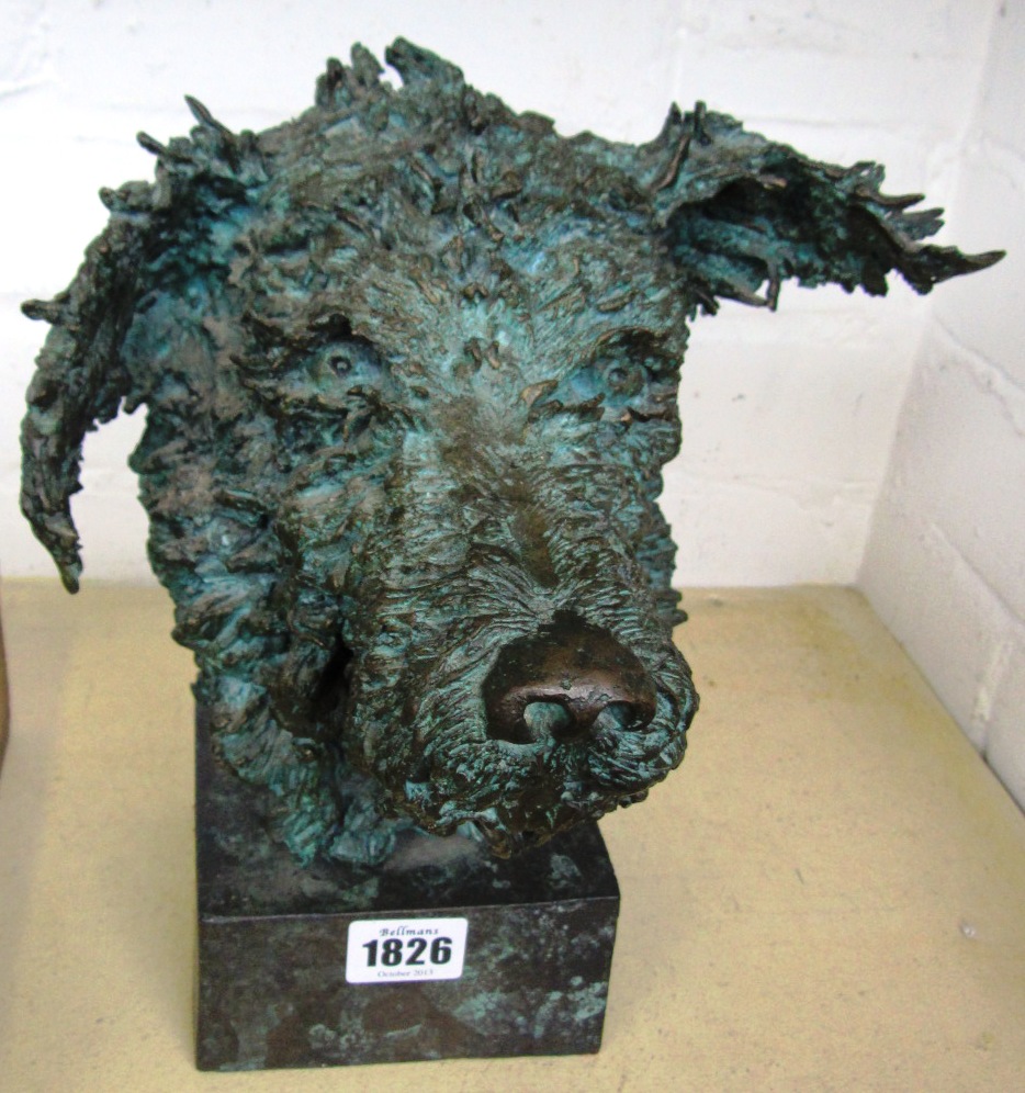 Appraisal: A contemporary bronze sculpture modelled and cast as a dogs