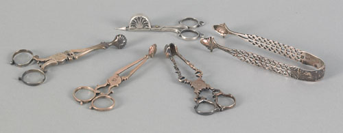 Appraisal: Three Georgian silver scissor tongs together with a small scissor