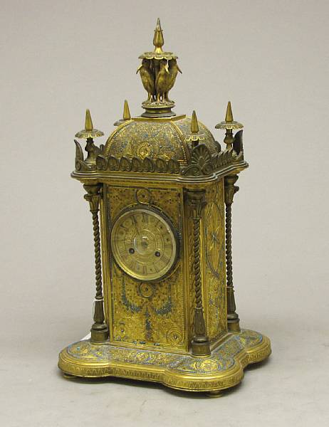 Appraisal: A French gilt bronze and 'jeweled' mantel clock in the