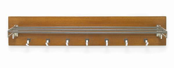 Appraisal: An Art Deco wall mounted coat rack mahogany and chromed