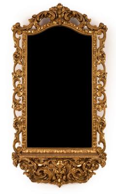 Appraisal: A gilt framed hall mirror the arched plate in scrolling