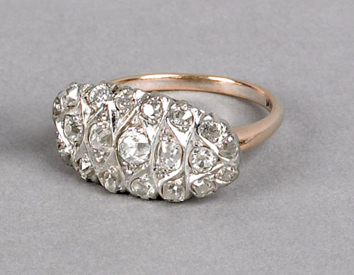 Appraisal: Diamond K yellow gold ring with old mine cut diamonds