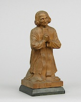 Appraisal: Hand Carved Figurine of a Kneeling Cleric circa th Century