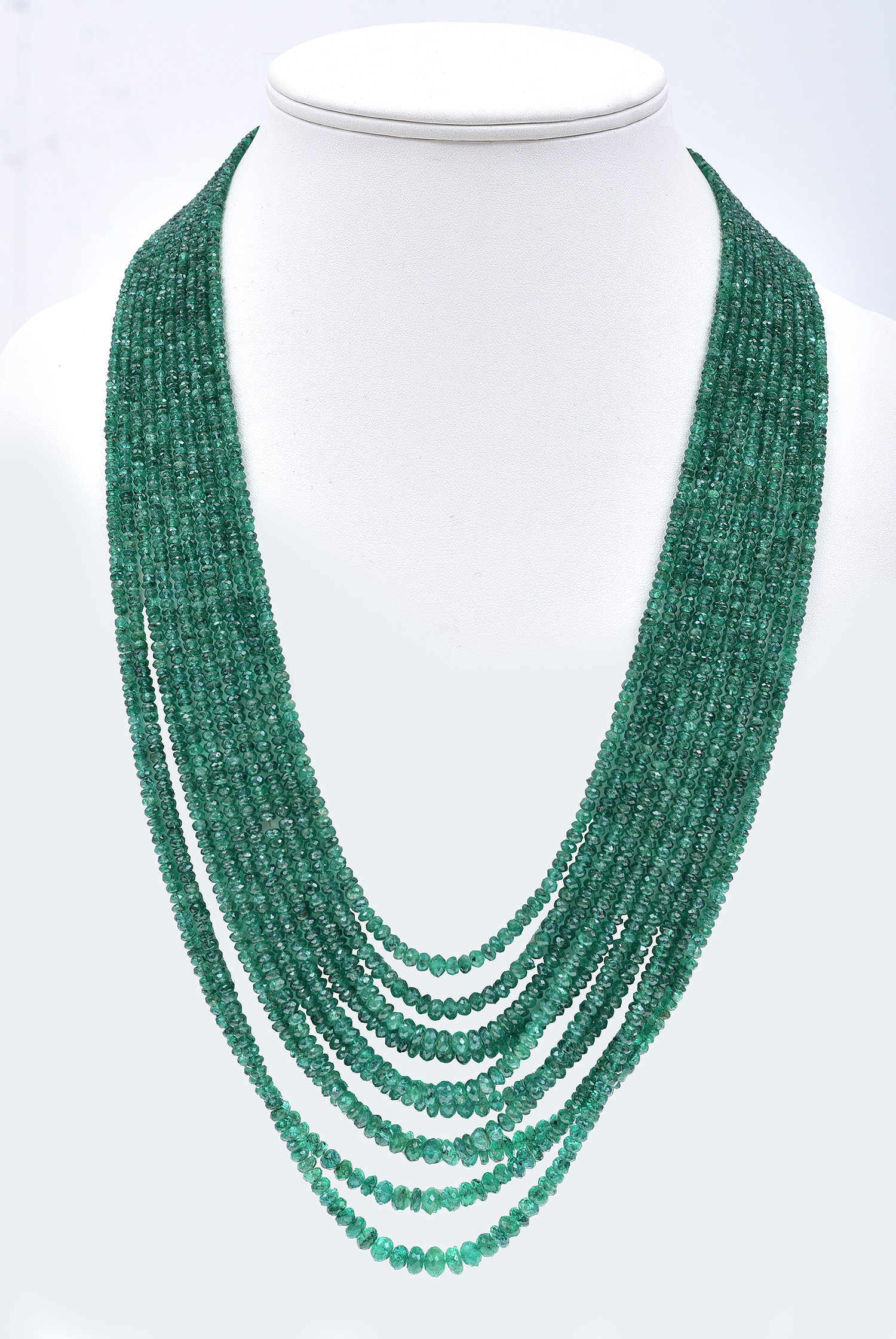 Appraisal: A MULTI-STRAND EMERALD NECKLACE Comprising ten graduated strands of faceted