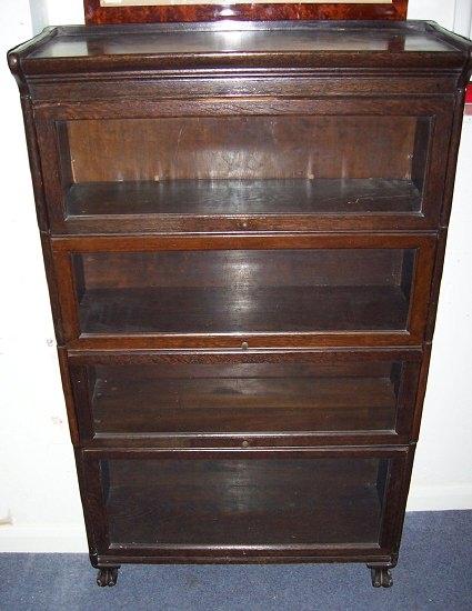 Appraisal: A Globe Wernicke style bookcase the four shelves each with