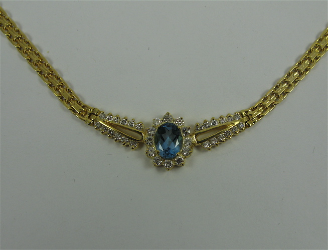 Appraisal: BLUE TOURMALINE DIAMOND AND K GOLD NECKLACE the pendant set