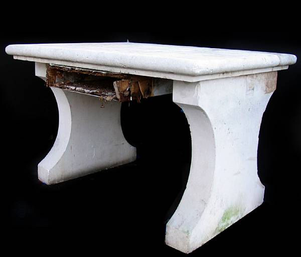 Appraisal: A French carved limestone rectangular table on shaped supports height