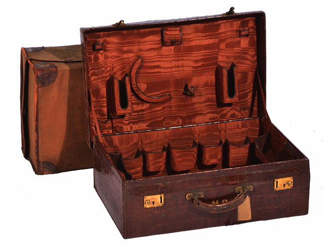 Appraisal: A FINNEGANS LONDON BROWN CROCODILE SKIN TRAVELLING CASE with gilt