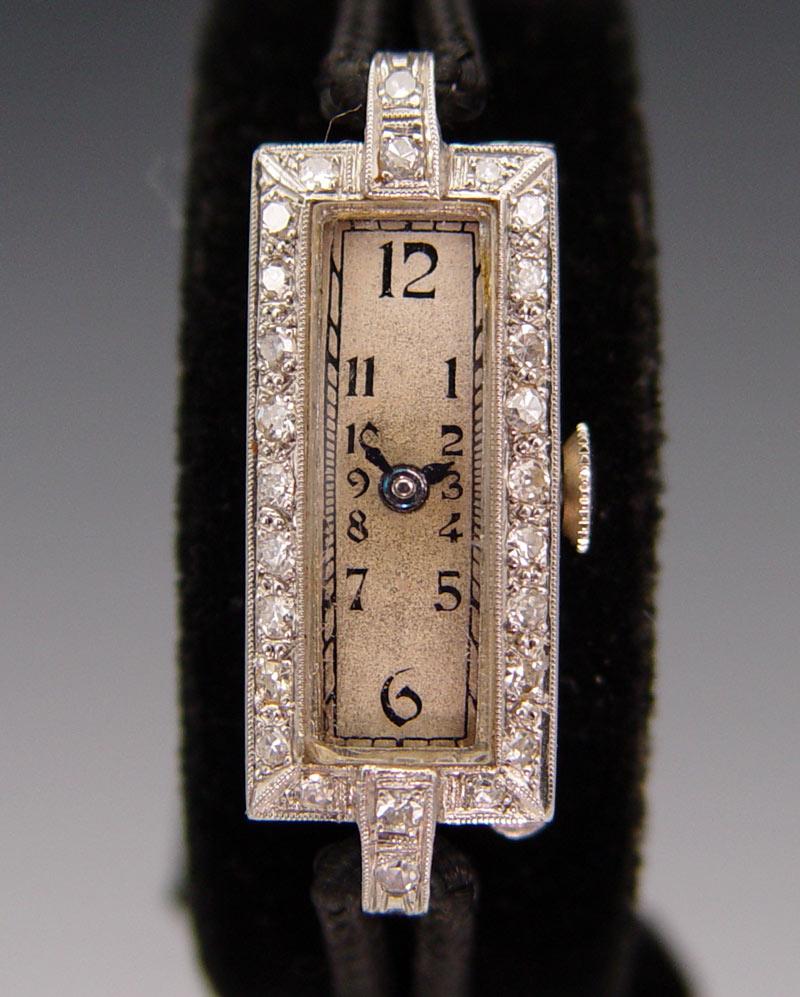 Appraisal: PAUL PORTINAUX PLATINUM DIAMOND WATCH Platinum with estimated carats of