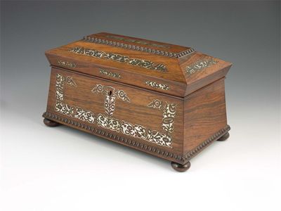 Appraisal: A Victorian rosewood and mother of pearl marquetry tea chest