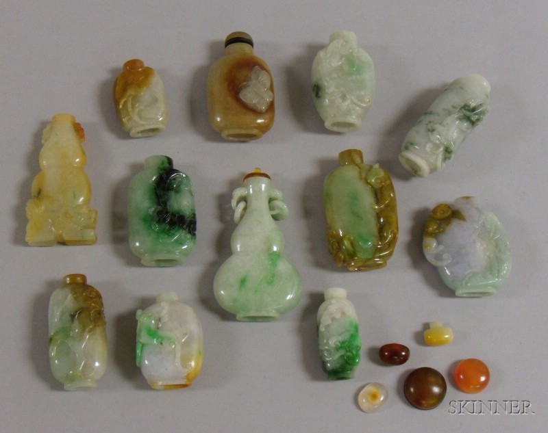 Appraisal: Twelve Carved Jade Snuff Bottles in various forms green brown