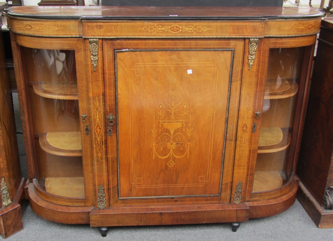 Appraisal: A Victorian gilt metal mounted marquetry inlaid walnut credenza with