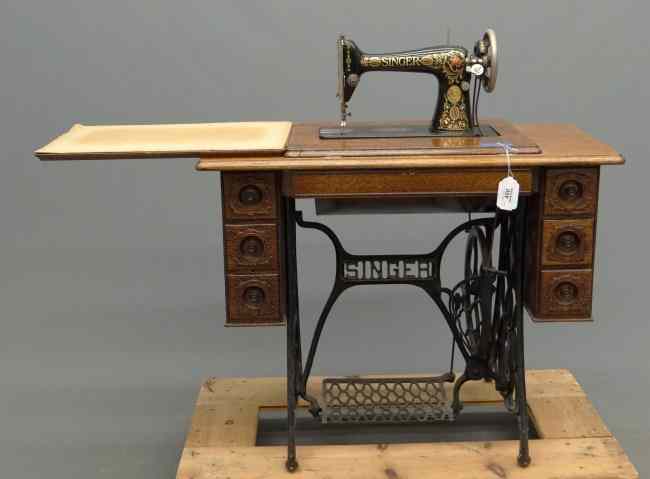 Appraisal: C 's oak case Singer sewing machine