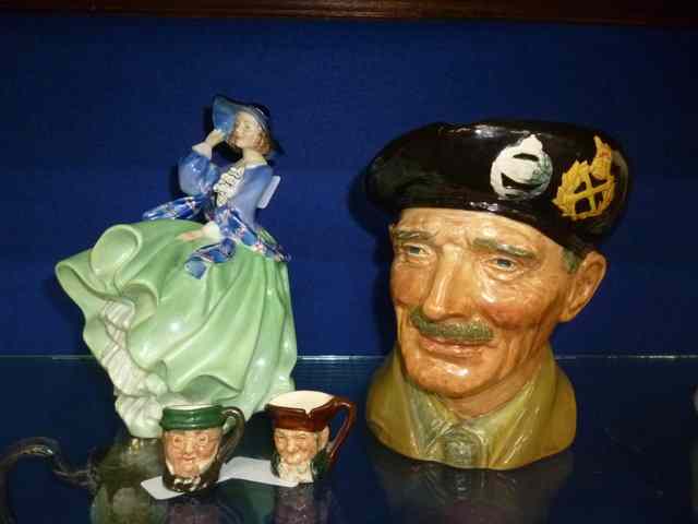 Appraisal: A ROYAL DOULTON 'TOP OF THE HILL' HN FIGURINE together