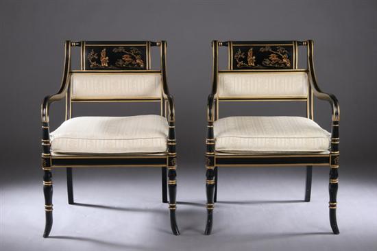 Appraisal: PAIR REGENCY-STYLE EBONIZED AND PARCEL-GILT OPEN ARMCHAIRS th century Drexel