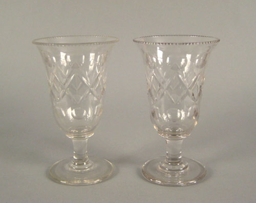 Appraisal: Pair of colorless glass celery vases mid th c h