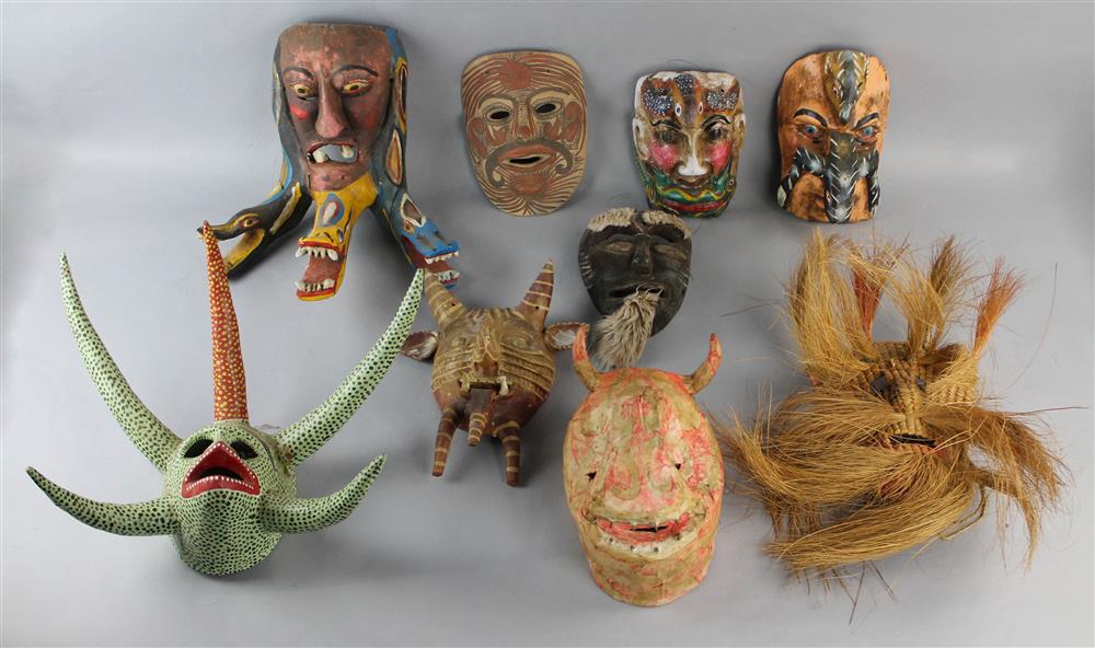 Appraisal: COLLECTION OF MEXICAN MASKS of painted wood ceramic papier mache