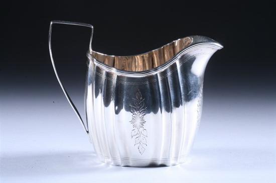 Appraisal: GEORGE III SILVER CREAMER TL London circa Rectangular with fluted