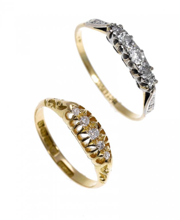 Appraisal: TWO DIAMOND FIVE-STONE RINGS with old cut diamonds gold hoop