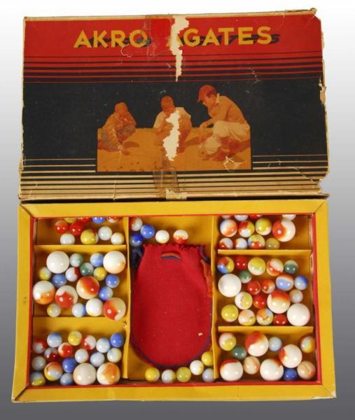 Appraisal: Akro Agates No Marbles Box Set Description Marbles are tri-color